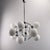 Stunning chandelier made of chrome-plated metal with 12 white glass globes in beautiful condition. Very chic space-age...