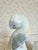 A graceful pair of Italian alabaster bookends featuring sculptural bird forms with softly carved details. The translucent...