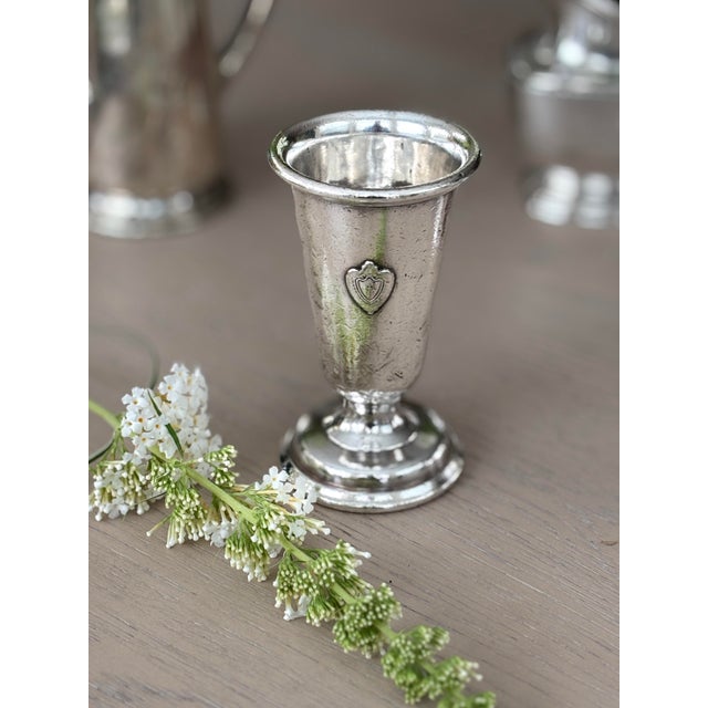 Authentic mid-century hospitality history. This 4.5" pedestal bud vase was custom manufactured by the International Silver...