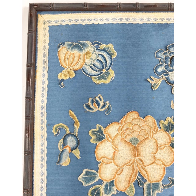 We are selling this framed Chinese embroidery panel with forbidden stitch appliques applied to a silk ground....