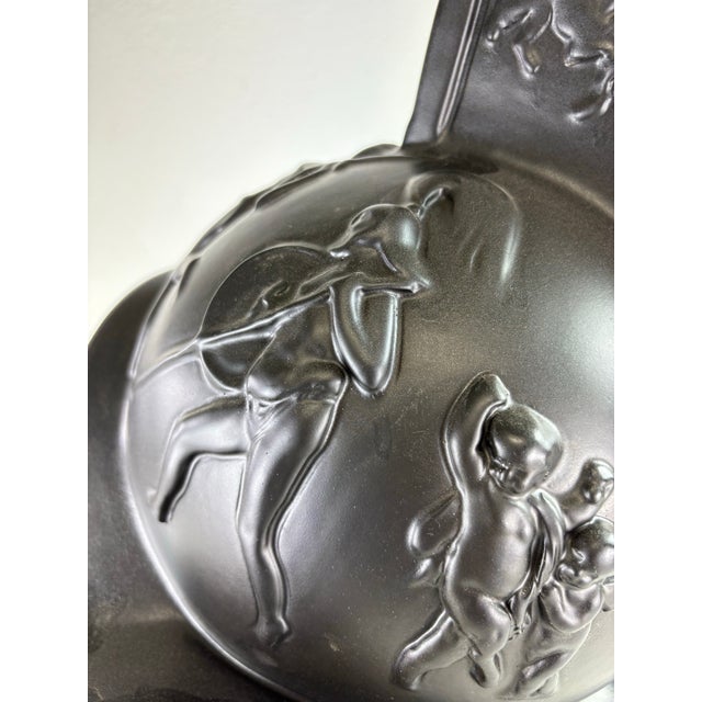 This is a mid-century vintage large dynamic Greco-Roman inspired military bust. This plaster bust has a dark bronze...