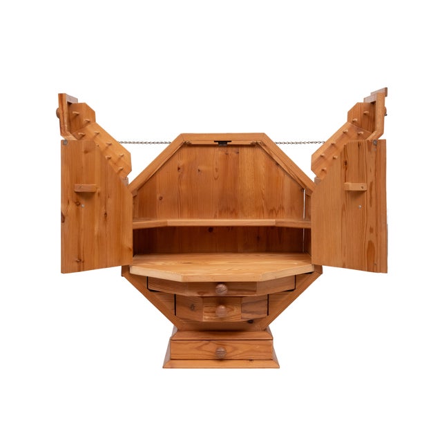 Unique Metamorphic Solid Pine Dry Bar .Hexagon shaped , comes with folding out top . Doors and 3 drawers .lots off space...