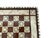 This handmade wooden chess board is crafted in a traditional antique style and beautifully decorated with genuine mother...