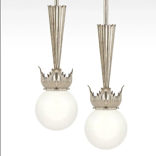 These excellent and elegant pair of Austrian Art Deco Pendant lamps have been designed by school of Dagobert Peche in...