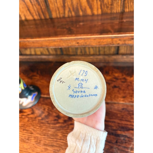 This vibrant pair of mid-century Dutch pottery vases was produced by Koninklijke Goedewaagen in Gouda, Holland. Each vase...