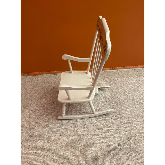 1970s Vintage White Wooden Children’s Nursery Rocking Chair With Black Etching and Music For Sale - Image 10 of 11