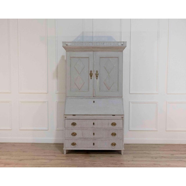 This rare Scandinavian two-part secretary dates to the late 18th century and exemplifies the refined craftsmanship of...