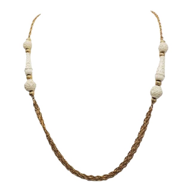 Vintage 1970s Signed Crown Trifari Carved Faux-Ivory Sautoir Necklace For Sale