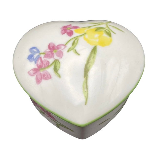 Porcelain heart shaped box made in France for D Porthault. White with a detailed floral pattern- D Porthault's "Printemps"...
