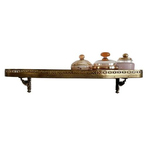 This beautiful vintage mid-century Italian half-moon wall console features beautiful inlaid wood, a brass trim, and...