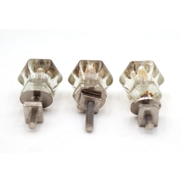 Vintage clear hexagon glass cabinet or drawer pulls paired with steel screws. Mounting screws are included. Good condition...