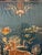 Qing dynasty embroidered silk tapestry with the mythical qilin creature. It is embroidered in gold. The symbol on top is...