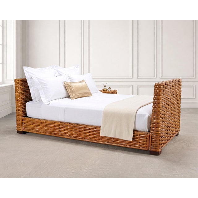 A beautifully crafted 20th century rattan and cane wicker bed frame crafted in the Organic Modern manner and style of...