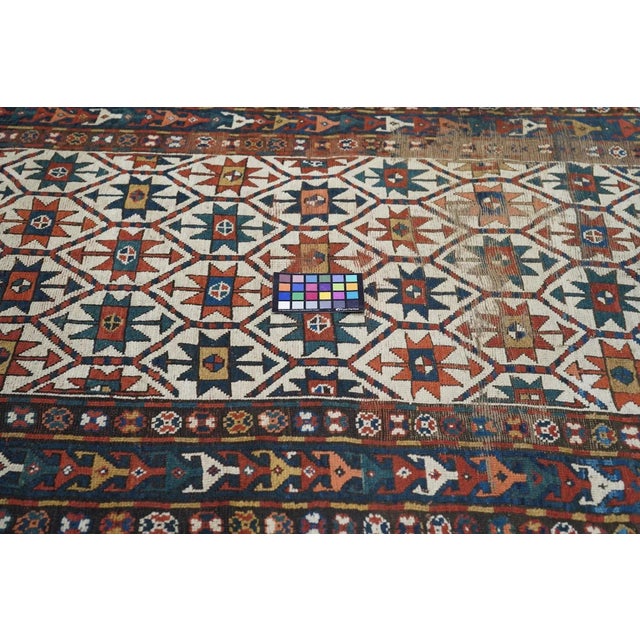 Antique Kazak Rug 4' x 8'1''.