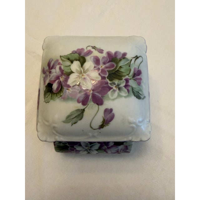 Porcelain trinket boxes, often referred to as pillboxes or snuff boxes, gained significant popularity in the 18th and 19th...