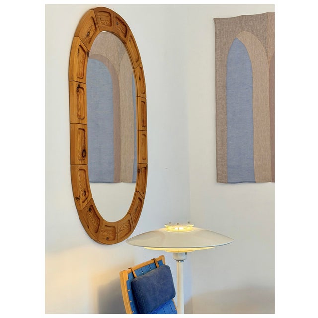 Large sculptural wall mirror with pine frame. In perfect vintage condition