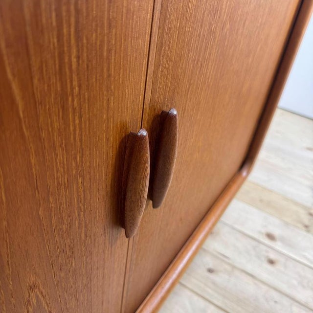 Dyrlund teak sideboard with retractable doors, Denmark 1960