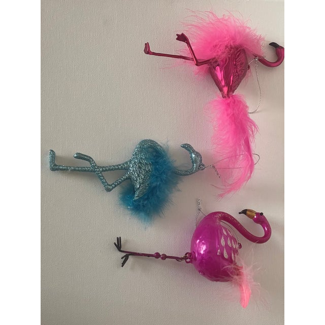Spectacular flamingo figurines Christmas ornaments, handmade blown glass and the blue one in acrylic.