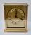 Vintage (1970's) Desk/Mantel Clock has a Contemporary Style. Made by Bulova. Brushed Brass Finish. Roman Numeral Display....