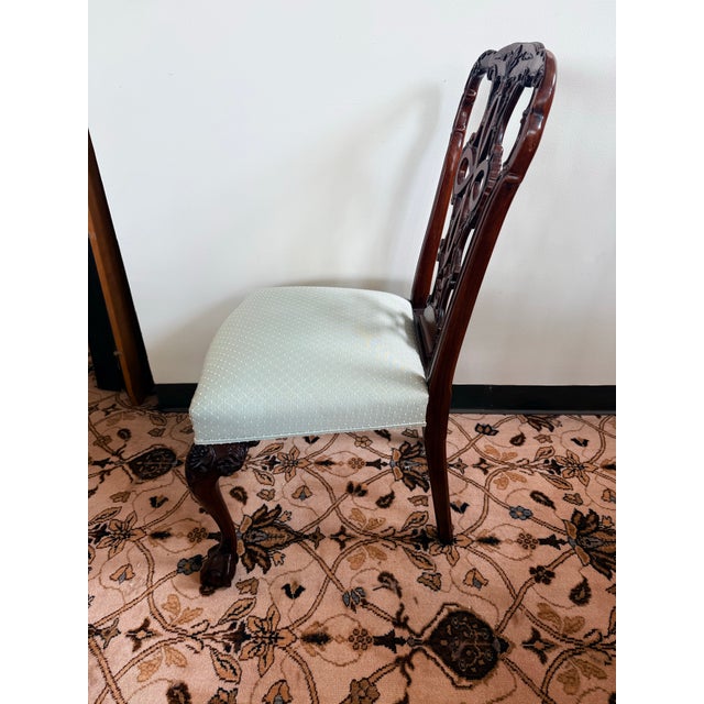 Set of magnificent Chippendale carved mahogany dining chairs that were custom made out of fine mahogany and feature a...