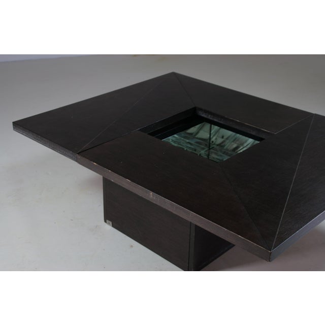 An icon of 1970s french design, this cocktail coffee table with a hidden bar, designed by paul michel for roche bobois,...