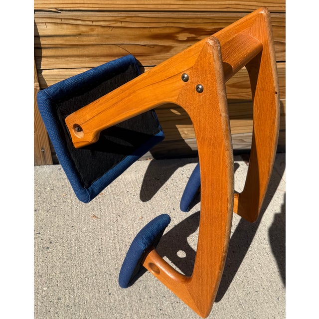 Danish Teak Ergonomically Balens Chair. New, woven, blue industrial auto upholstery fabric.