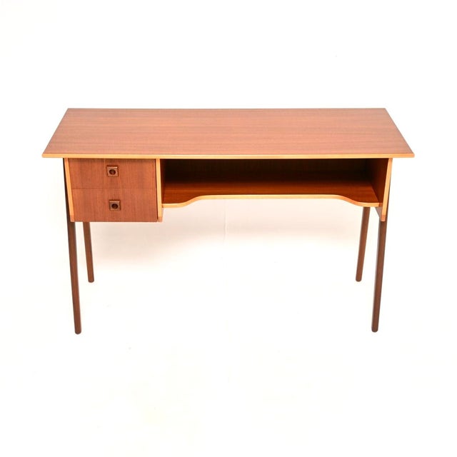 A stylish and very well made Danish vintage teak free standing desk. This was made in Denmark, it dates from the 1960’s....