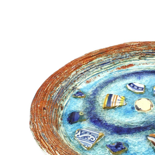 Antique-style Faenza plate, handcrafted and hand-painted in Faenza majolica. Dimensions: 35 cm diameter x 5 cm height....