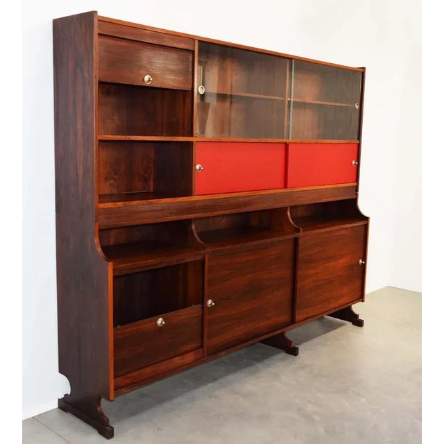 Sideboard consisting of 2 overlapping blocks in Bubba wood, equipped with 2 sliding glass, 4 sliding doors, 2 of which red...