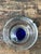 A striking example of Mid-Century Modern design, this vintage clear glass ashtray embodies the era's appreciation for...