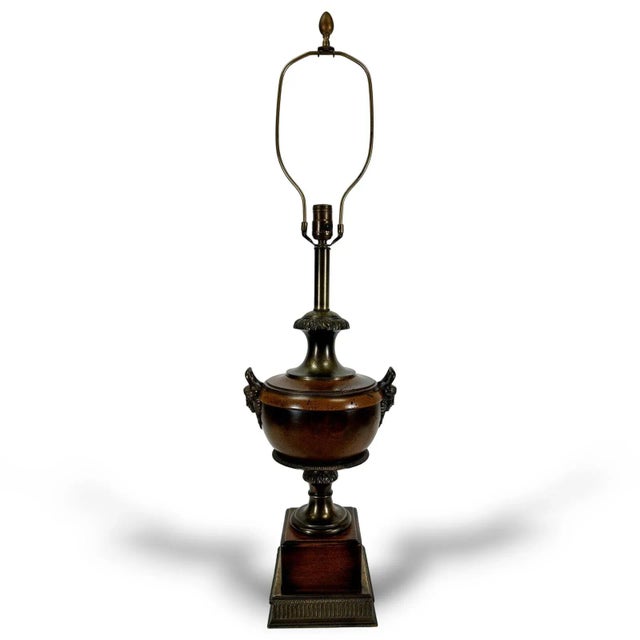 Mid-century Frederick Cooper Table lamp. French Empire style, carved and stained wood with figural brass mounts and...