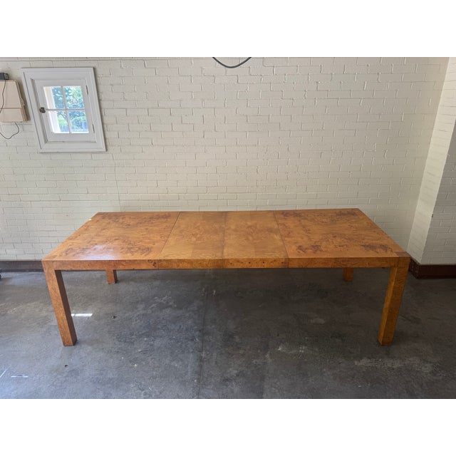 Wonderful Milo Baughman style burl wood Parsons extension dining table manufactured by Lane furniture. Featuring clean...