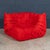 The iconic "Togo" sofa, originally designed by Michel Ducaroy for Ligne Roset in 1973, has become a mid-century design...