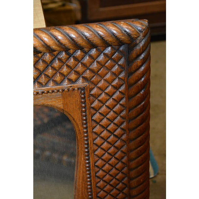 This is a gorgeous wooden mirror! Has some weight to it so a solid hardwood I believe, possibly oak. Rope twist &...