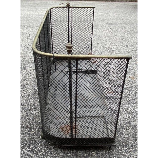 Antique English Brass and Black Metal Fireplace Fender, 19th Century. Used primarily in children’s nursery fireplaces, to...