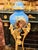 This elegant French-style porcelain vase features a rich blue finish accented with intricate gold leaf detailing, creating...