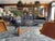 Vintage 1960s Adrian Pearsall triangular coffee table with a thick glass top and sculptural solid walnut base. The angular...