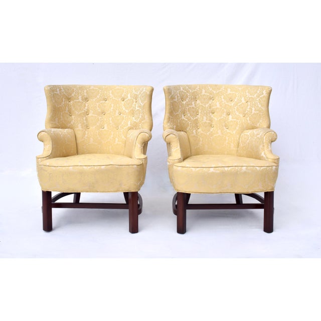 Unique Chippendale style pair of chairs with lovely small scale silhouettes, curved stretchers in golden butter Damask...