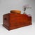 An exceptional Japanese hibachi cabinet with a warm reddish-brown wood tone, zinc-lined fire compartment, five drawers and...