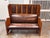 Design Plus Gallery presents an Antique High-Back Oak Settle Bench. This antique bench has an oak frame with a high...