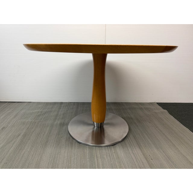 Design Plus Gallery presents the Hasu Dining Table of Post Modern + Japanese Design. The table has a maple wood table top...