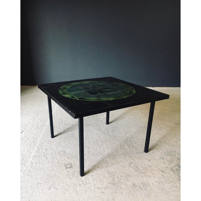 Vintage Midcentury Modern Art Studio ceramic Tile Coffee Table. Made in Belgium, 1960's period. Black steel base with...