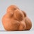 Free-form ceramic sculpture created in the 1970s. The rounded volume, composed of soft, solid forms, evokes a pebble or a...