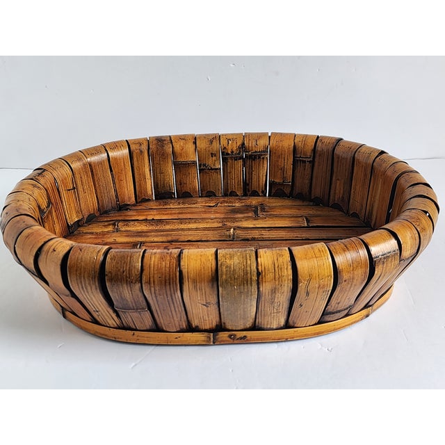 Hand crafted Interlude Home Inc. large rattan and bamboo center piece or display basket, inspired from the Mid Century...