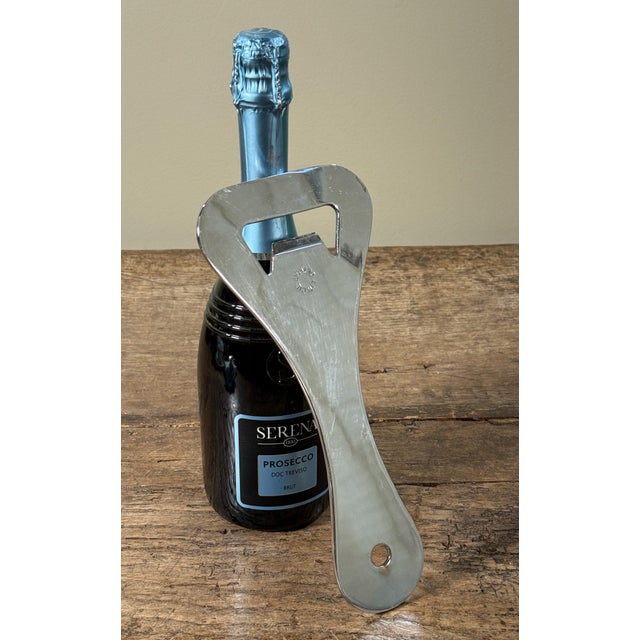 This oversized bottle opener by Litedie of Detroit is a great example of mid-century American industrial design. Cut from...