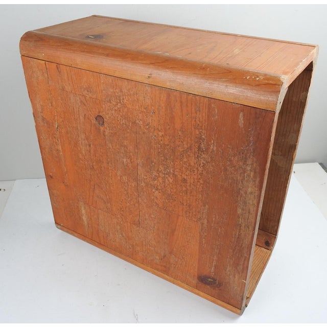 Small mid 20th century pine side table. Unique joinery creating crved edges inside and outside. Unsigned. Much scuffing,...