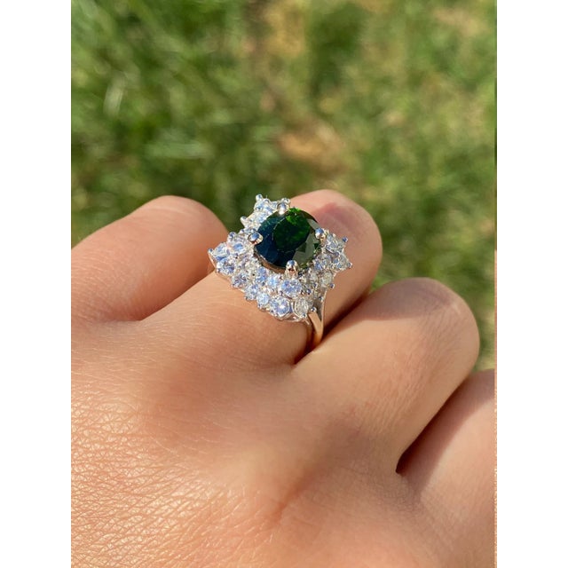 The Pearse Antique 14K and Platinum Gold Double Diamond Waterfall Halo Cocktail Ring set with Chrome Diopside. This...
