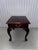 Matched pair of genuine Thomasville brand Chippendale-style end tables in stunning flame mahogany with satinwood...