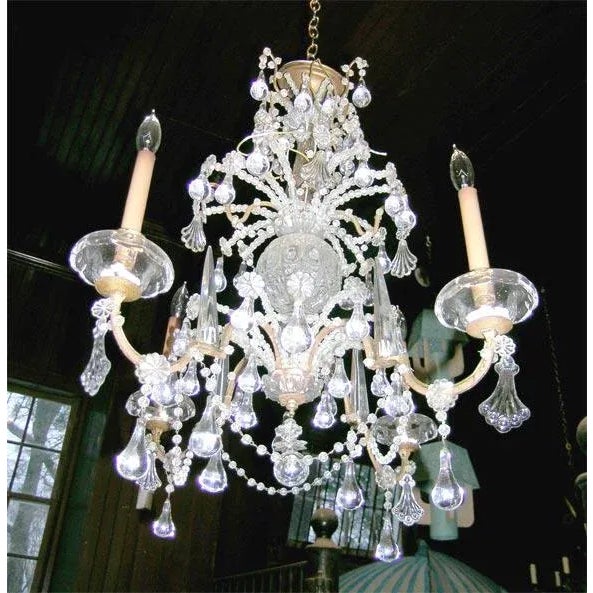 Fine quality four-arm beaded French crystal chandelier.