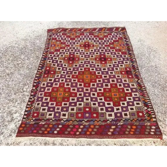 This beautiful, vintage, handwoven kilim is approximately 70 years old. It is handmade, of very fine quality hand spun...